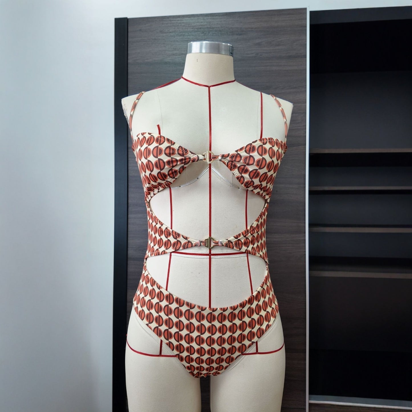 Women's Printed Cutout One-Piece Swimsuit with Metal Accents